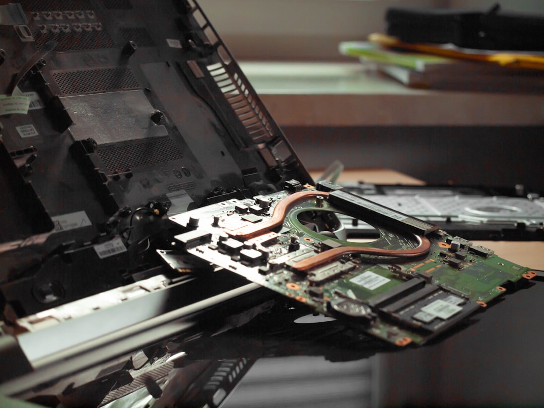 Services an-open-laptop-computer-sitting-on-top-of-a-table-nb2sjttoqma